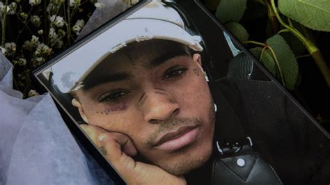 xxtenations morto|XXXTentacion death: Four men charged with rappers。